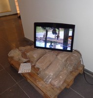 As he waits for a traffic light to turn