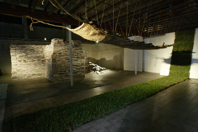 Hanging, 2004, burlap, twine, wood, grass